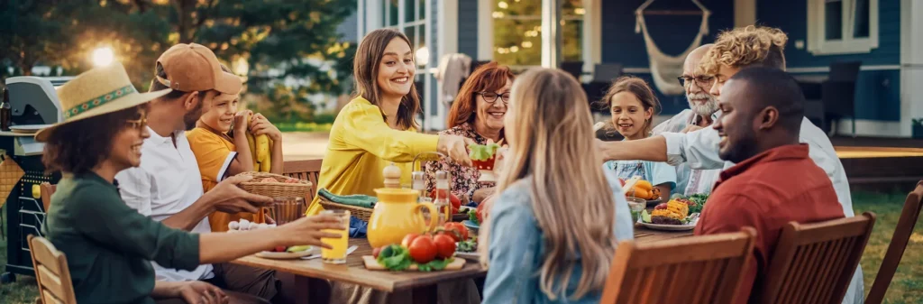 Large family gathering outdoors on a patio